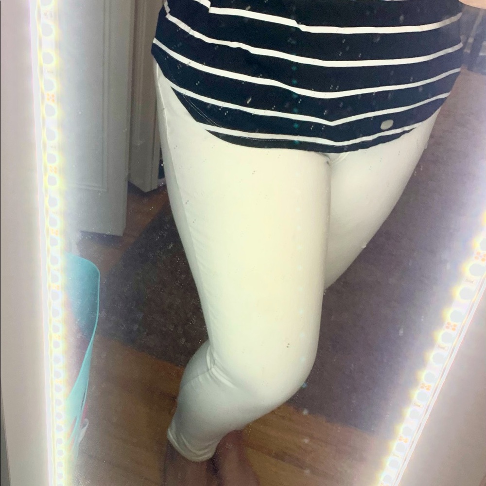 White crop ankle skinny jeans